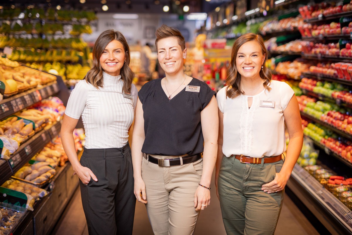 Harmons dietitian team in a grocery store